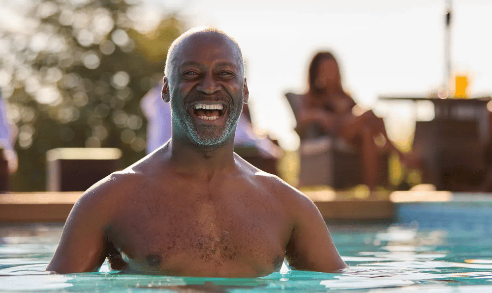 Man Laughing in Swimming Pool