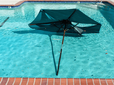 Umbrella Damage in Swimming Pool