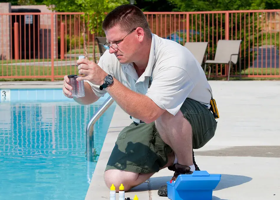 Pool professional testing water